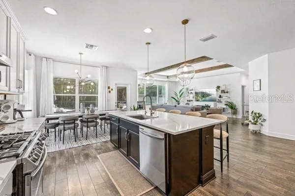 a view of a dining room with furniture window and outside view