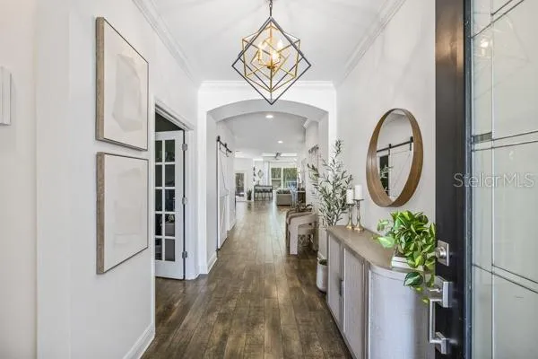 a dining room with furniture window wooden floor