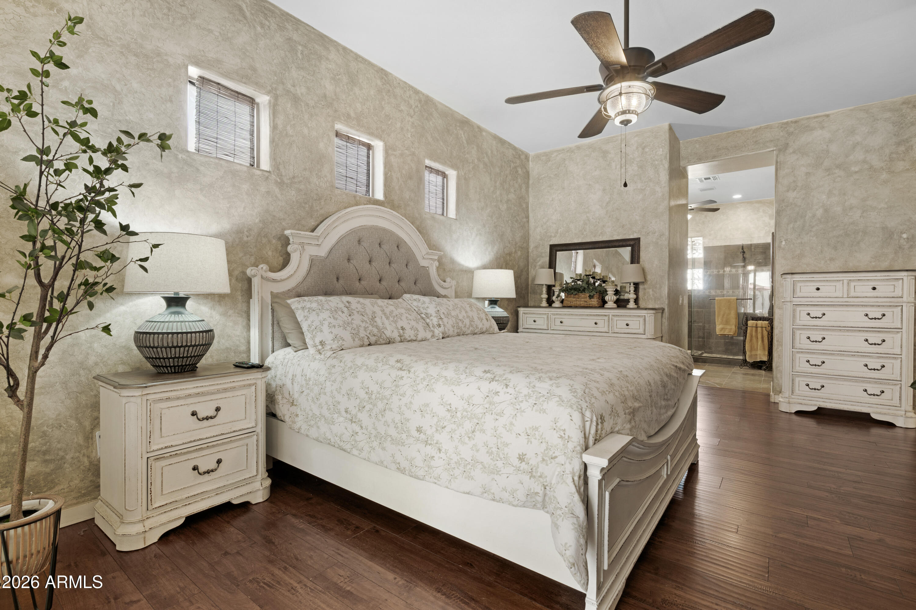 2107 East Beautiful Lane Phoenix, AZ 85042 - Photo 18 of 36 a bed room with a bed and a tv