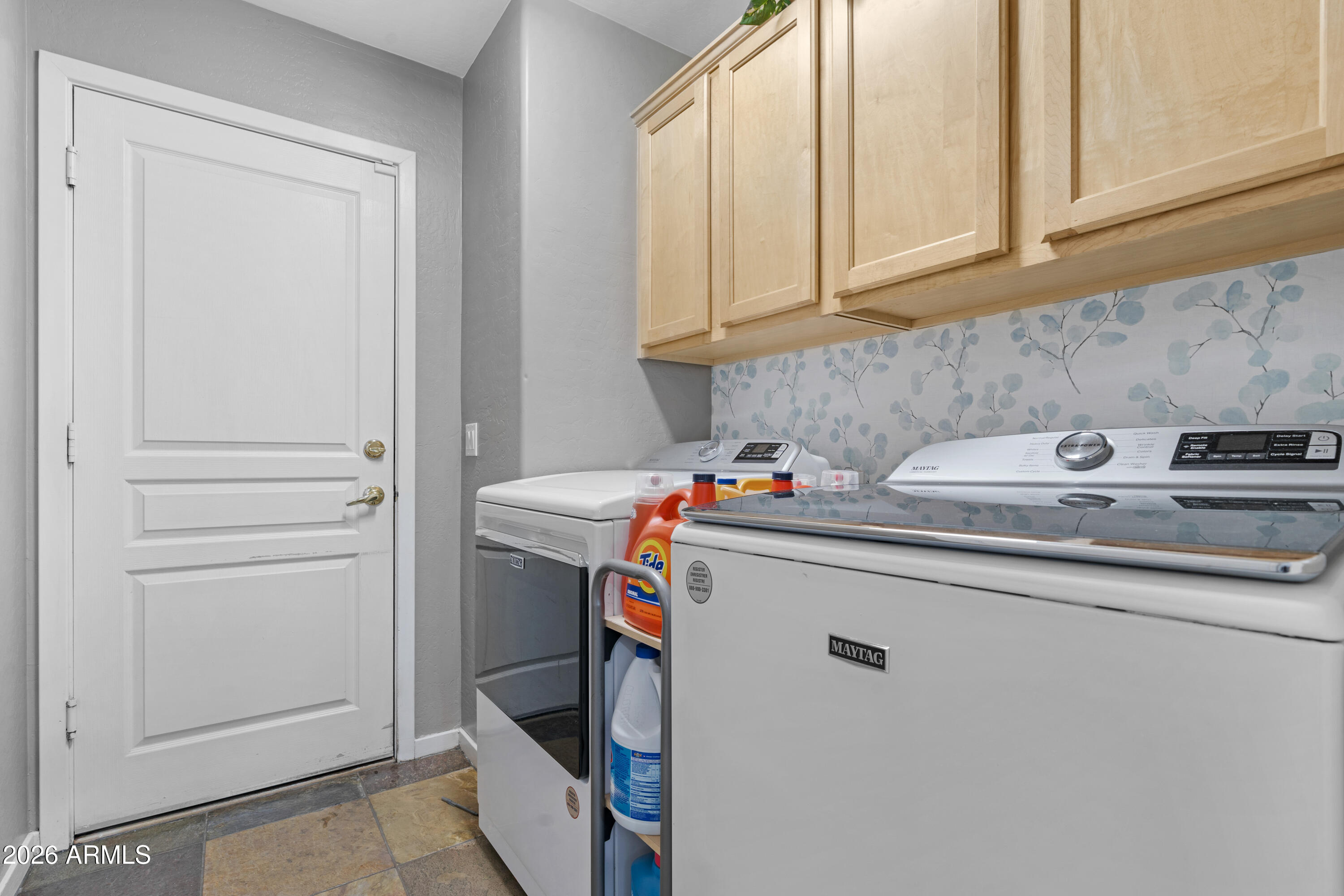 2107 East Beautiful Lane Phoenix, AZ 85042 - Photo 28 of 36 a utility room with dryer and washer