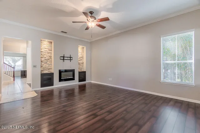 a kitchen with stainless steel appliances granite countertop a refrigerator sink and cabinets