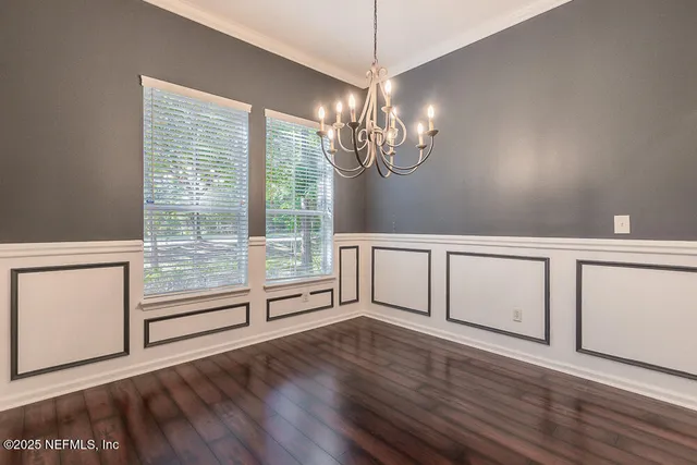 a view of a livingroom with wooden floor