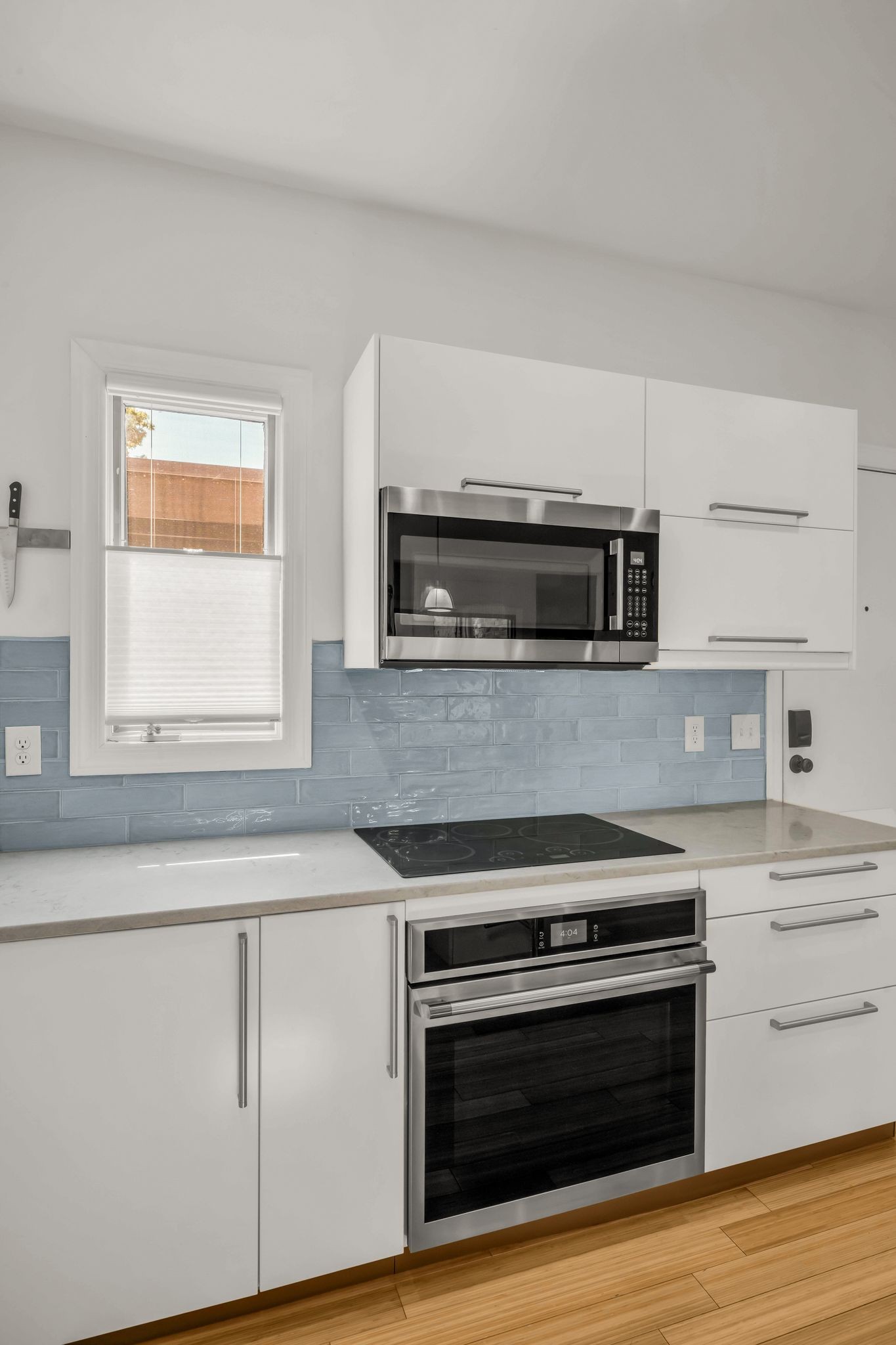 694 Timber Lane Nashville, TN 37215 - Photo 9 of 30 a kitchen with granite countertop a stove and a microwave