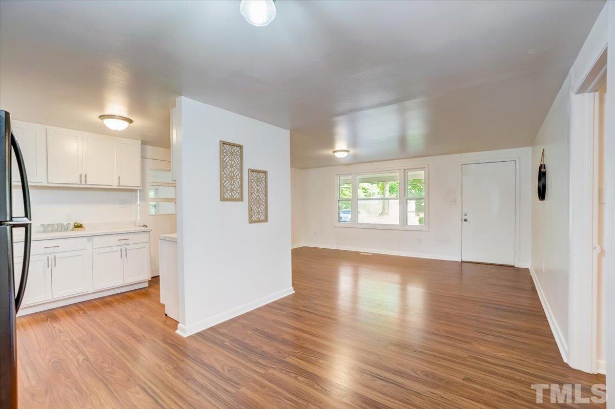 424 Grovemont Road Raleigh, NC 27603 - Photo 8 of 23 a view of an empty room and window