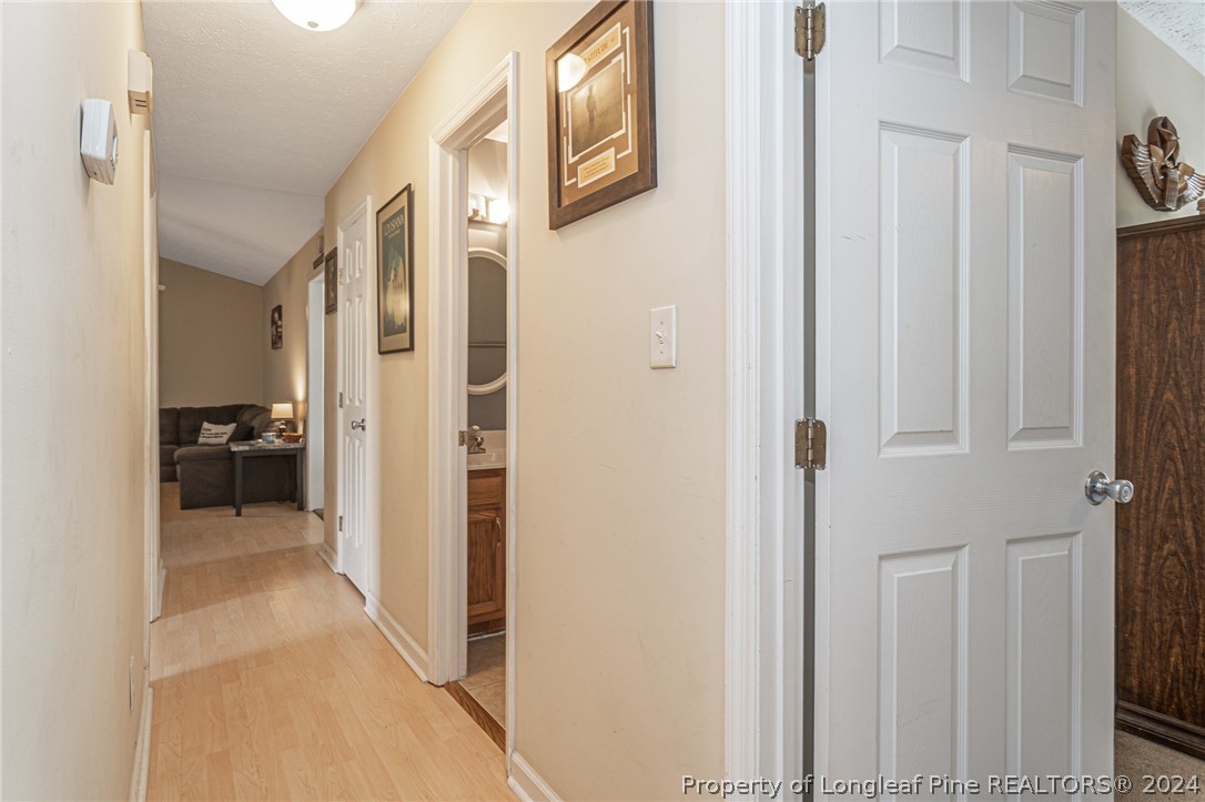 1955 Christopher Way Fayetteville, NC 28303 - Photo 15 of 35 a view of a hallway with a livingroom and a hallway
