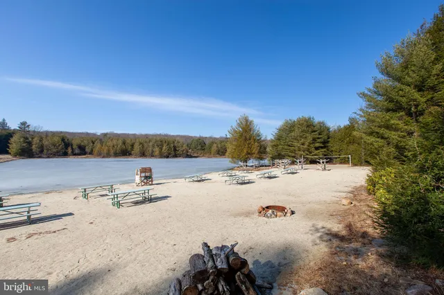 a view of outdoor space with playground and green space