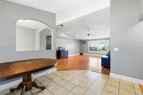 a kitchen with stainless steel appliances granite countertop a sink stove microwave and cabinets