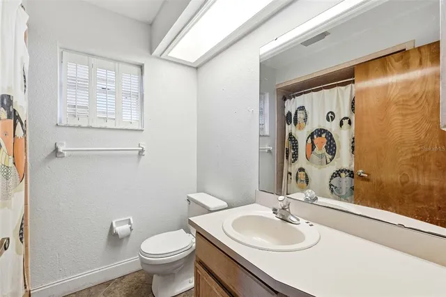 a house with trees in front of it