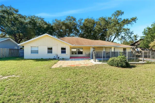 a view of a tables and chairs in patio
