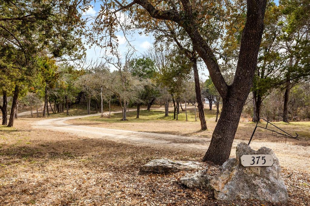 375 Panther Branch Road Valley Mills, TX 76689 - Photo 21 of 34 a view of a yard with swimming pool