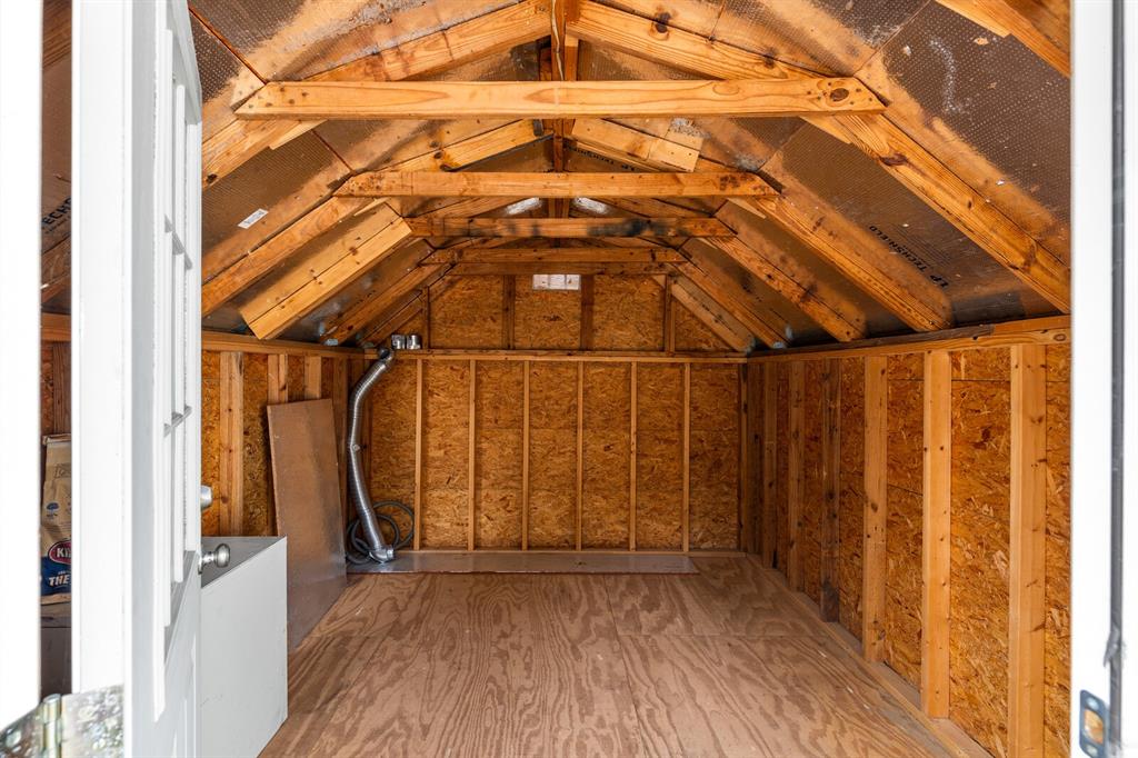 375 Panther Branch Road Valley Mills, TX 76689 - Photo 24 of 34 a view of a room with wooden walls and a window