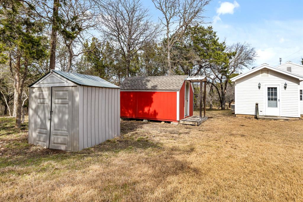 375 Panther Branch Road Valley Mills, TX 76689 - Photo 26 of 34 a view of a house with a yard and garage