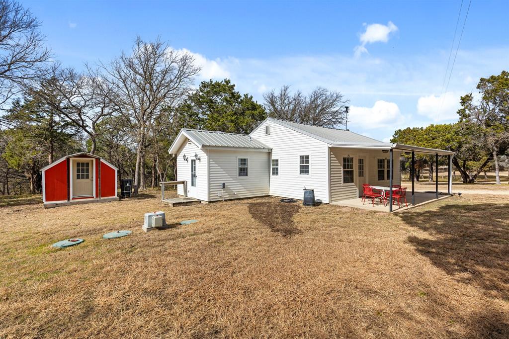 375 Panther Branch Road Valley Mills, TX 76689 - Photo 4 of 34 a view of a house with backyard and trees