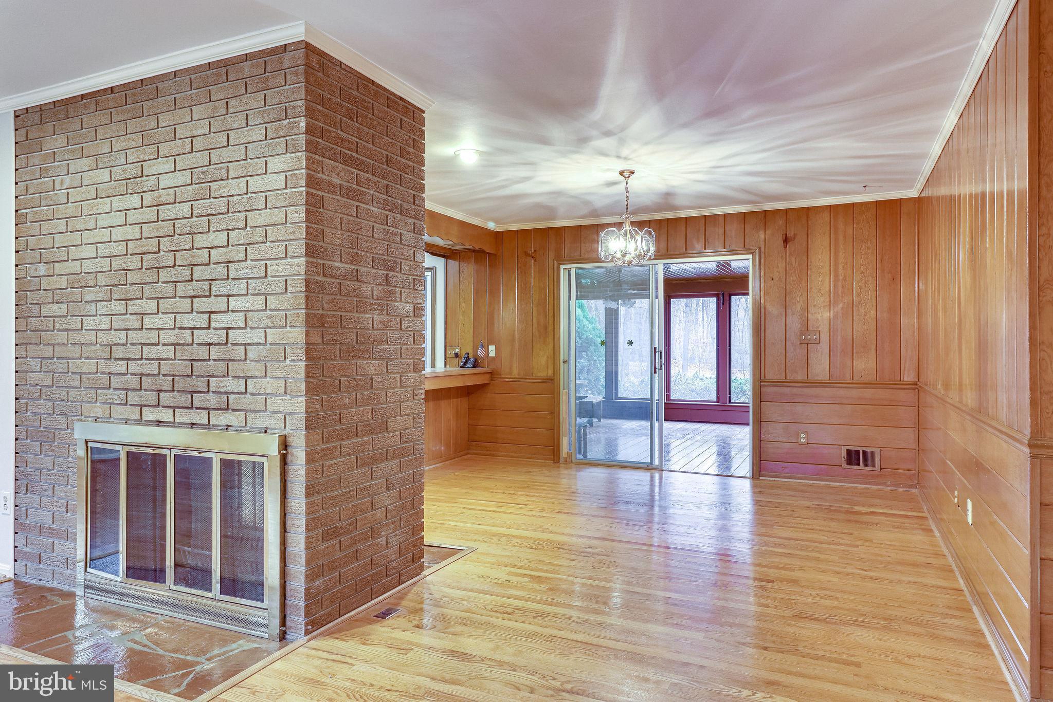 2030 Hunter Mill Road Vienna, VA 22181 - Photo 16 of 88 Dining room. Fire place is double sided