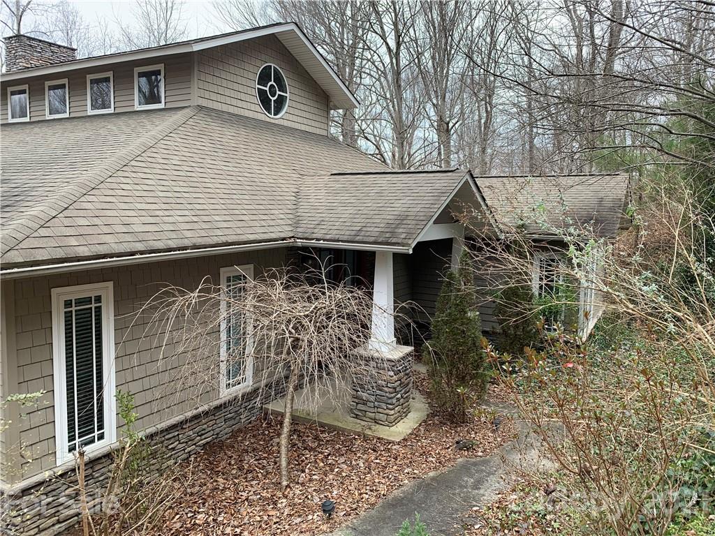 a front view of a house with parking