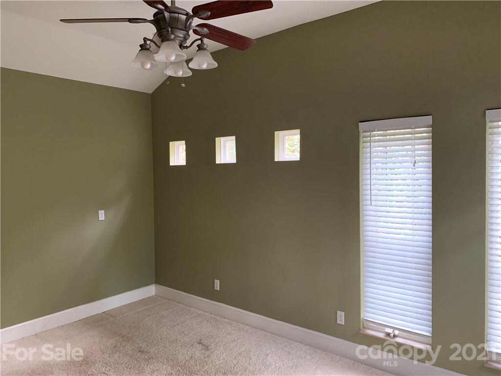 8060 Summit Ridge Drive Catawba, NC 28609 - Photo 13 of 32 a view of room with a ceiling fan and a window