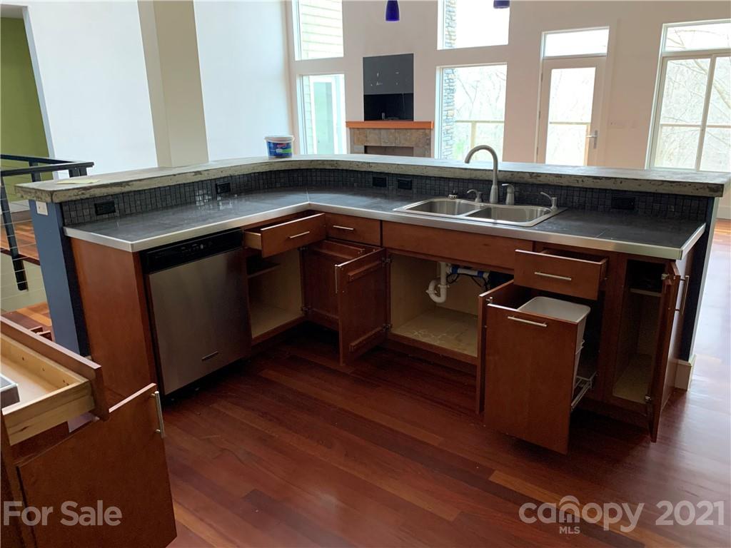 8060 Summit Ridge Drive Catawba, NC 28609 - Photo 14 of 32 a kitchen with a sink stove and cabinets