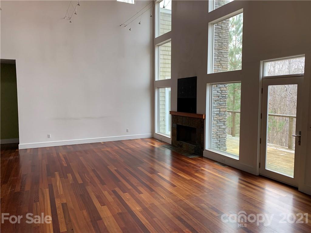 8060 Summit Ridge Drive Catawba, NC 28609 - Photo 15 of 32 a view of a livingroom with wooden floor and a fireplace