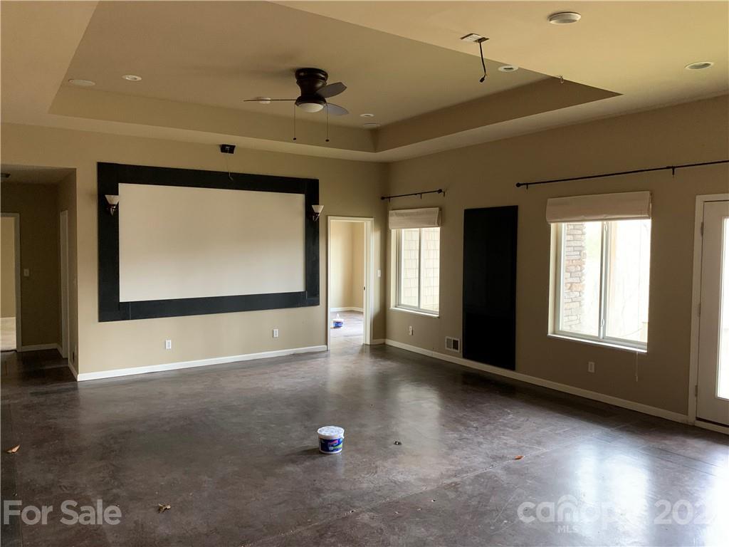 8060 Summit Ridge Drive Catawba, NC 28609 - Photo 23 of 32 a view of an empty room with a window and wooden floor