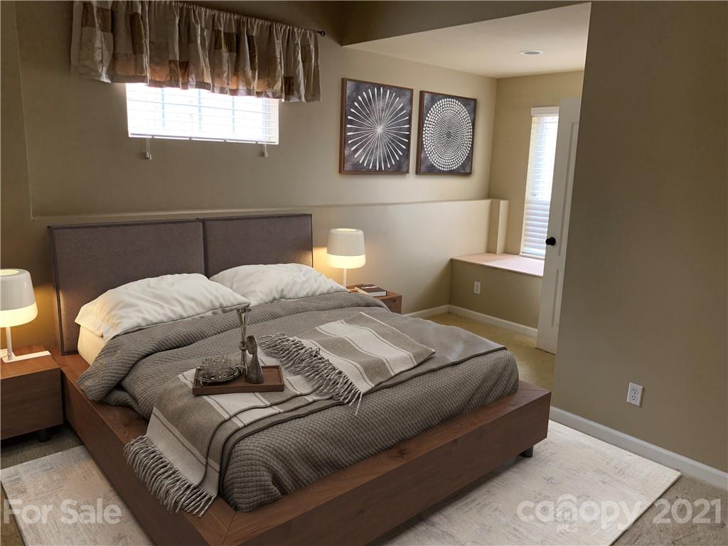 8060 Summit Ridge Drive Catawba, NC 28609 - Photo 29 of 32 a bedroom with a bed and a window