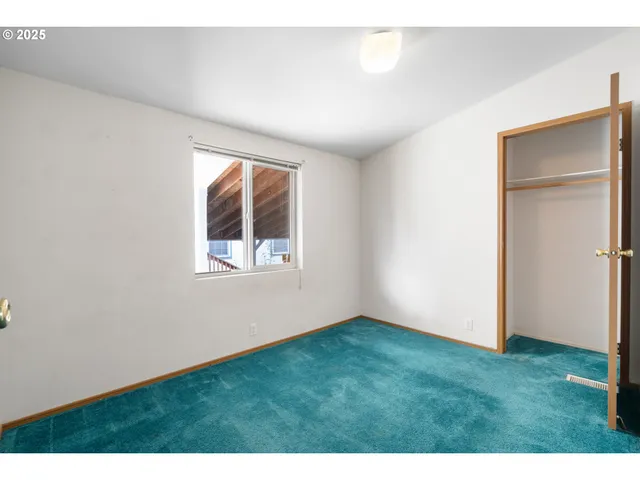 a view of an empty room with window