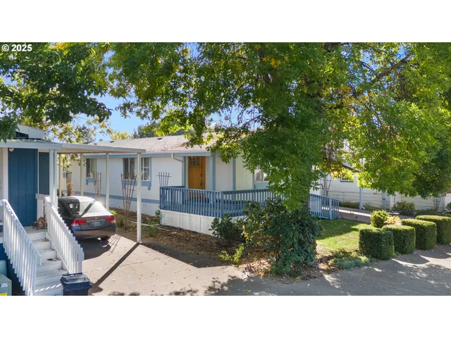 a black and white photo of a house