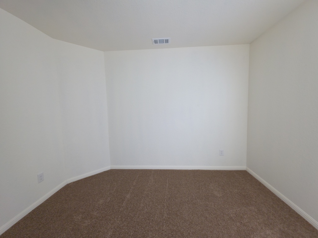 2002 West 2nd Street, Unit 1200 Taylor, TX 76574 - Photo 6 of 11 Primary bedroom