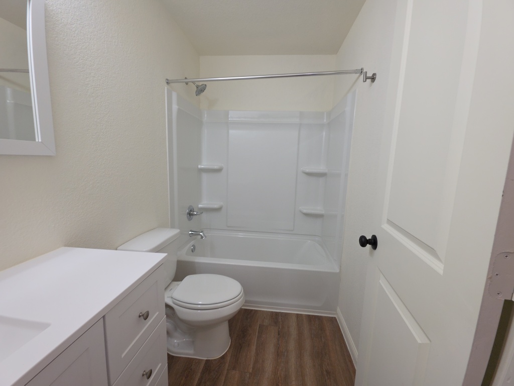 2002 West 2nd Street, Unit 1200 Taylor, TX 76574 - Photo 9 of 11 Full bathroom with shower/tub combination