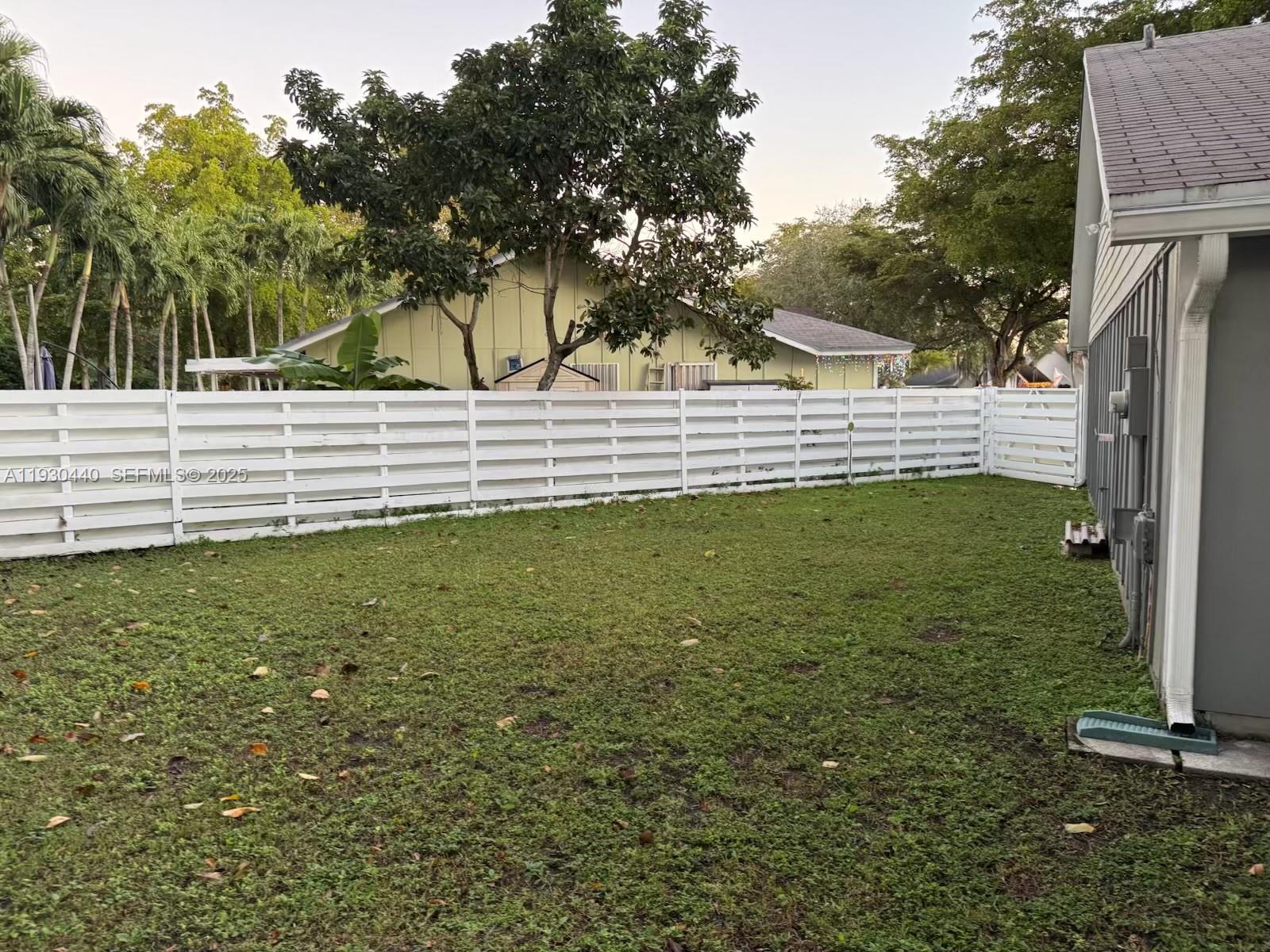 15120 Southwest 141st Place Miami, FL 33186 - Photo 11 of 13 a view of yard with tree
