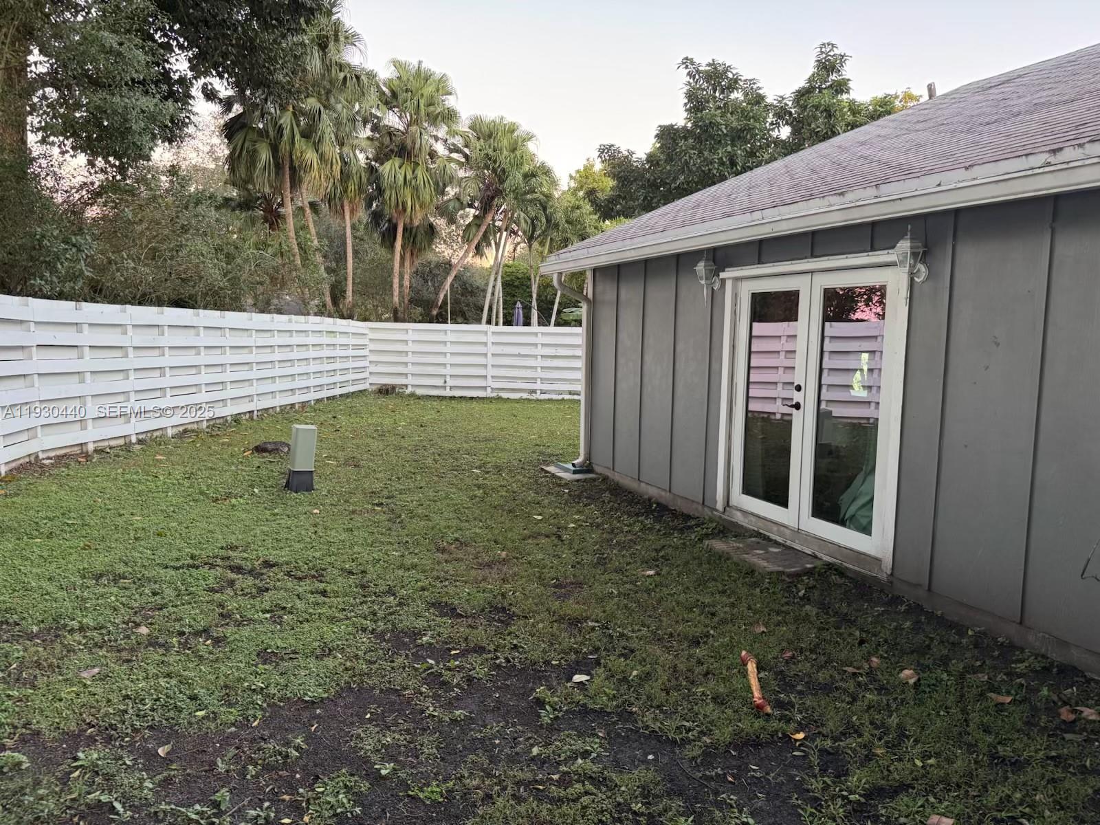 15120 Southwest 141st Place Miami, FL 33186 - Photo 9 of 13 a view of a backyard