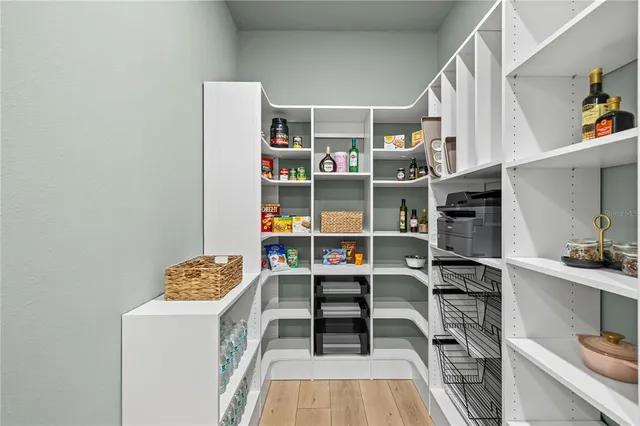 a view of workspace with cabinets