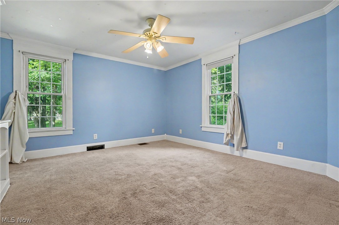 543 Fouse Avenue Akron, OH 44310 - Photo 46 of 50 Another view of the third bedroom, with ceiling fan and crown molding.