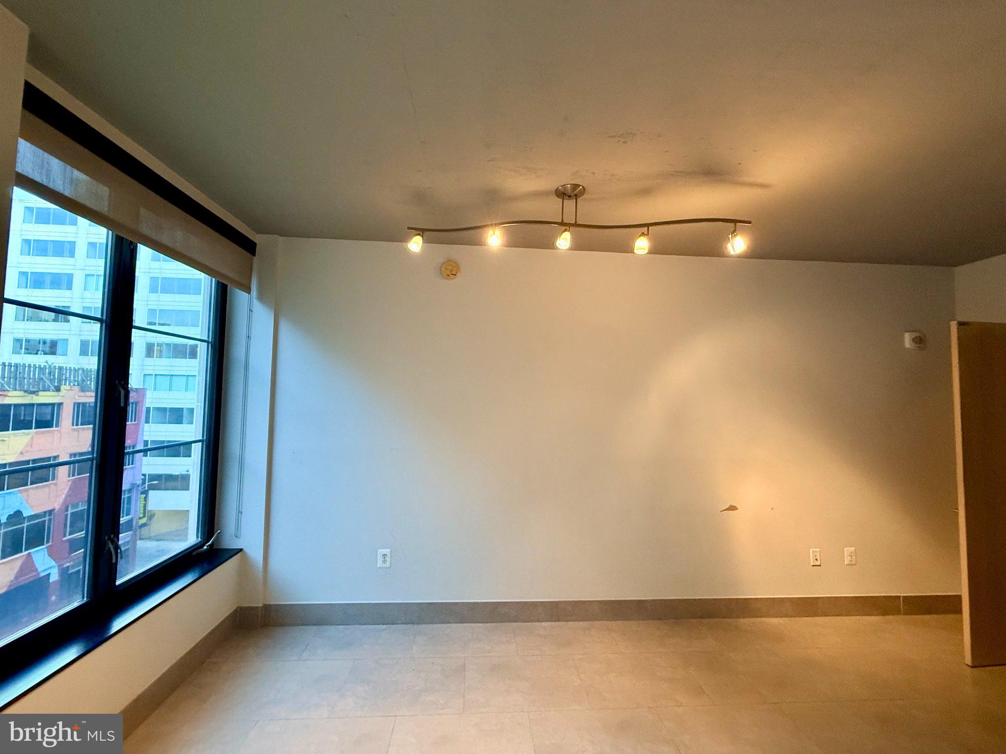 1133 14th Street Northwest, Unit 503 Washington, DC 20005 - Photo 13 of 29 Bright and airy urban living space.