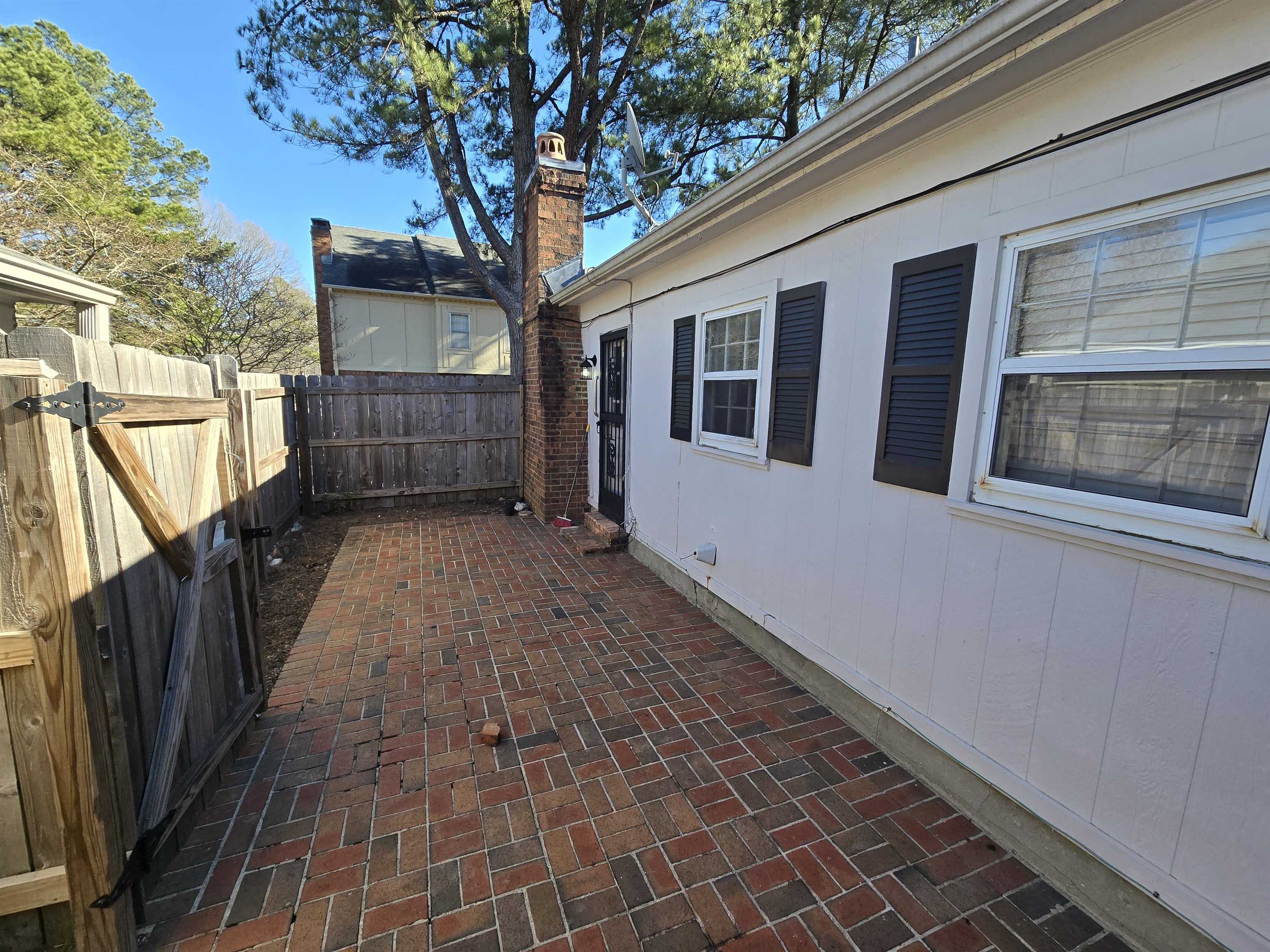 6985 Fords Station Road, Unit 41 Germantown, TN 38138 - Photo 20 of 20 Fenced backyard featuring a patio area