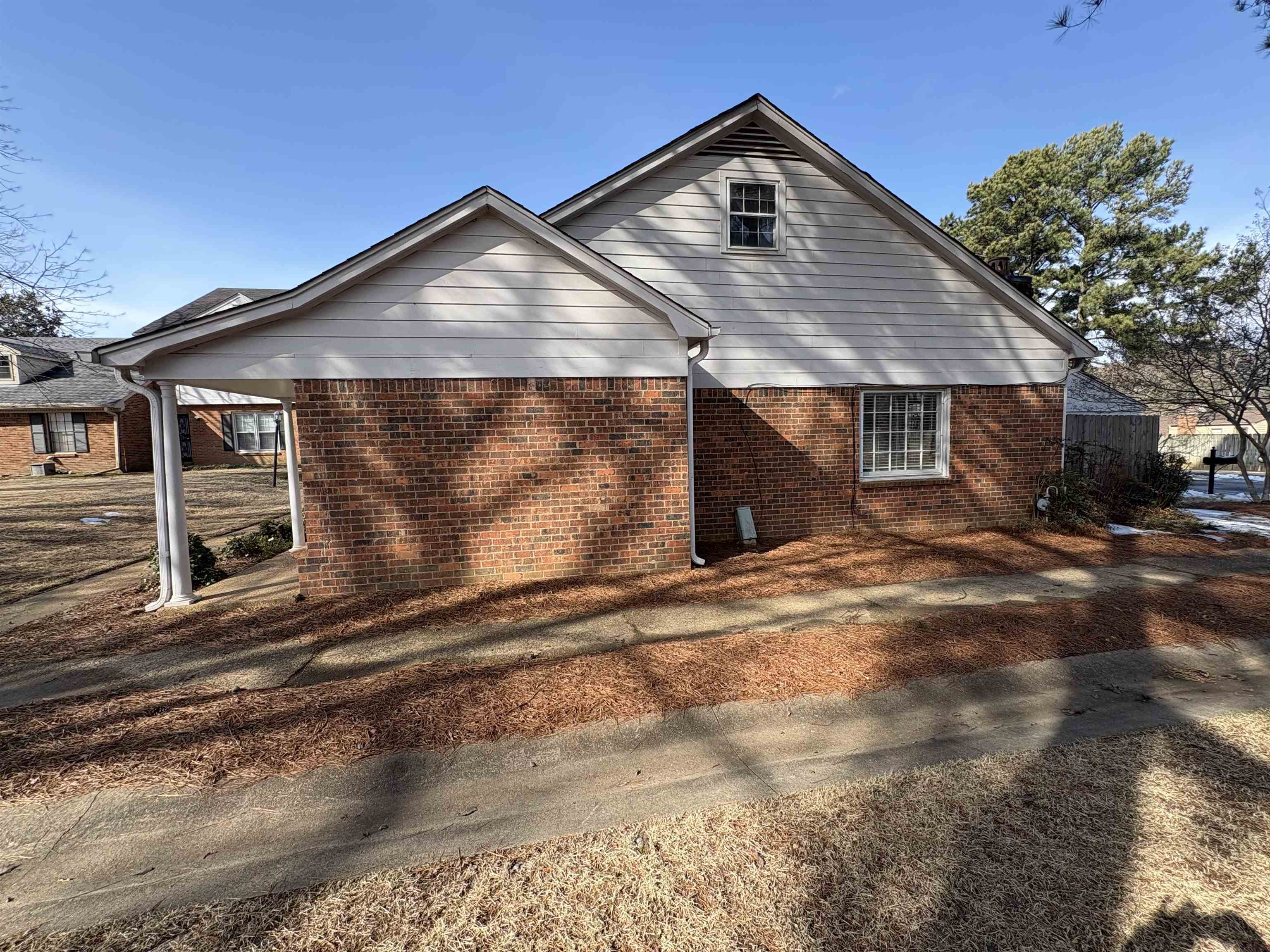 6985 Fords Station Road, Unit 41 Germantown, TN 38138 - Photo 5 of 20 View of side of home featuring brick siding