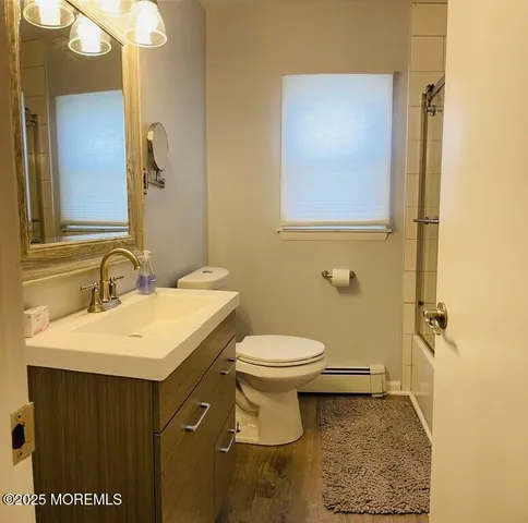 a bathroom with a sink and a toilet