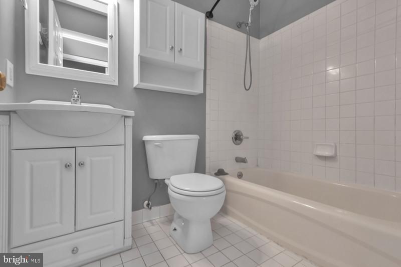1065 Cedar Ridge Court Annapolis, MD 21403 - Photo 17 of 22 a bathroom with a sink toilet and shower