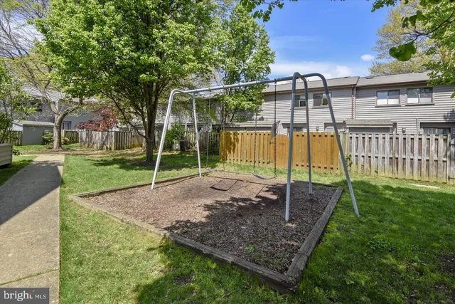 a view of a park with swings