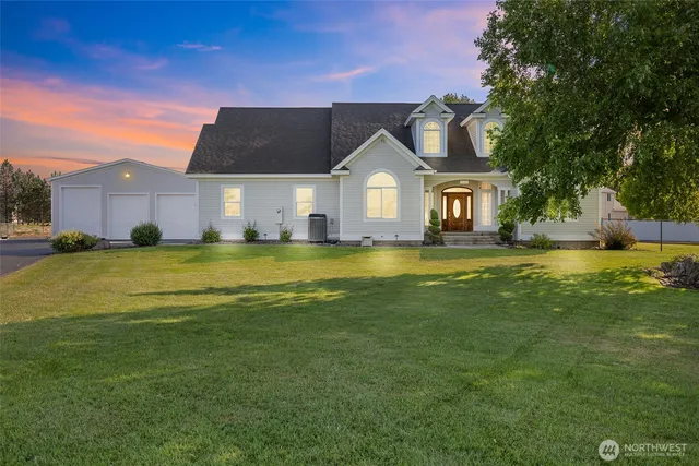 a view of a house with a big yard