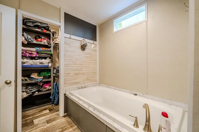 a view of workspace with furniture and a window