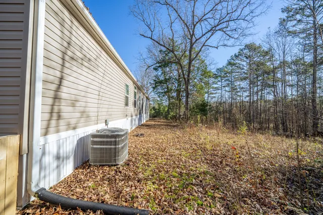 a view of a back yard of the house