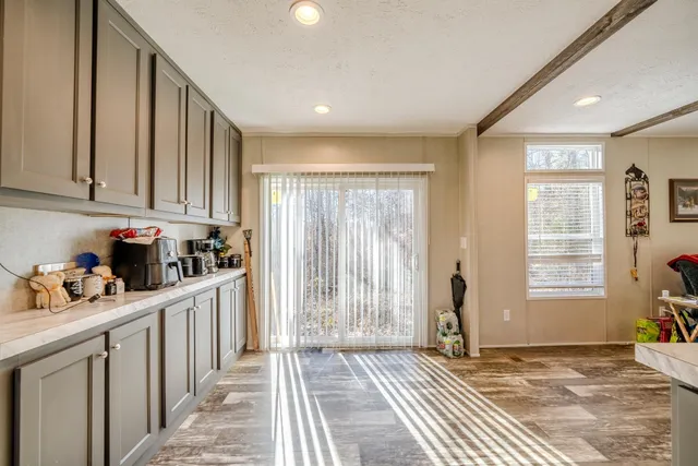 a kitchen with a sink cabinets and stainless steel appliances