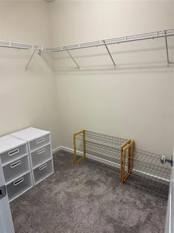 a view of an empty walk in closet