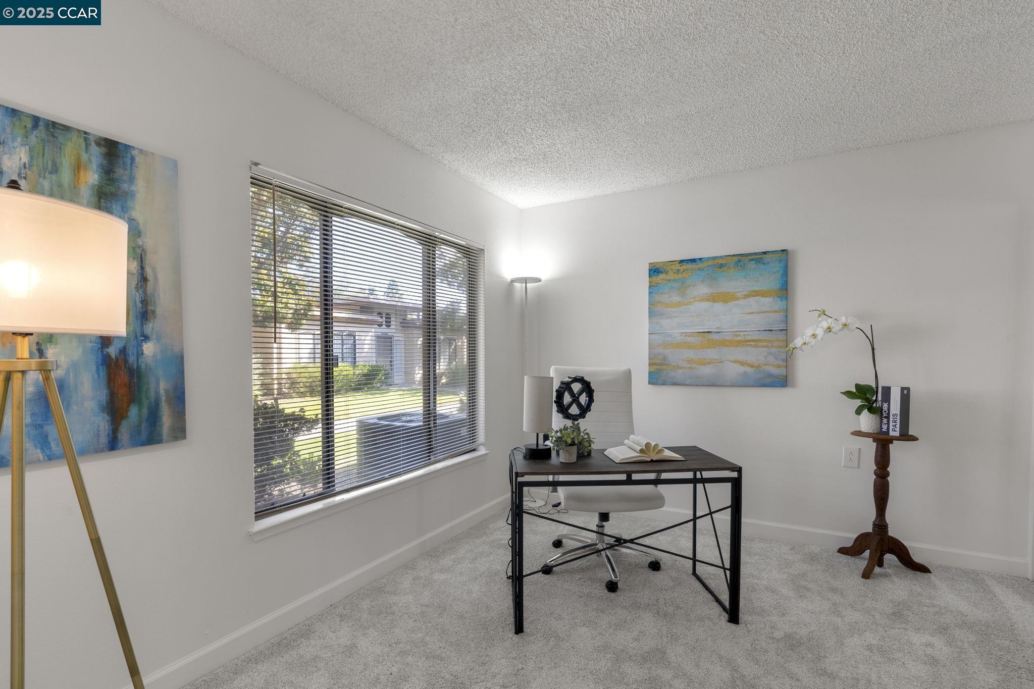 2017 Pine Knoll Drive, Unit 4 Walnut Creek, CA 94595 - Photo 15 of 21 a living room with furniture and a window