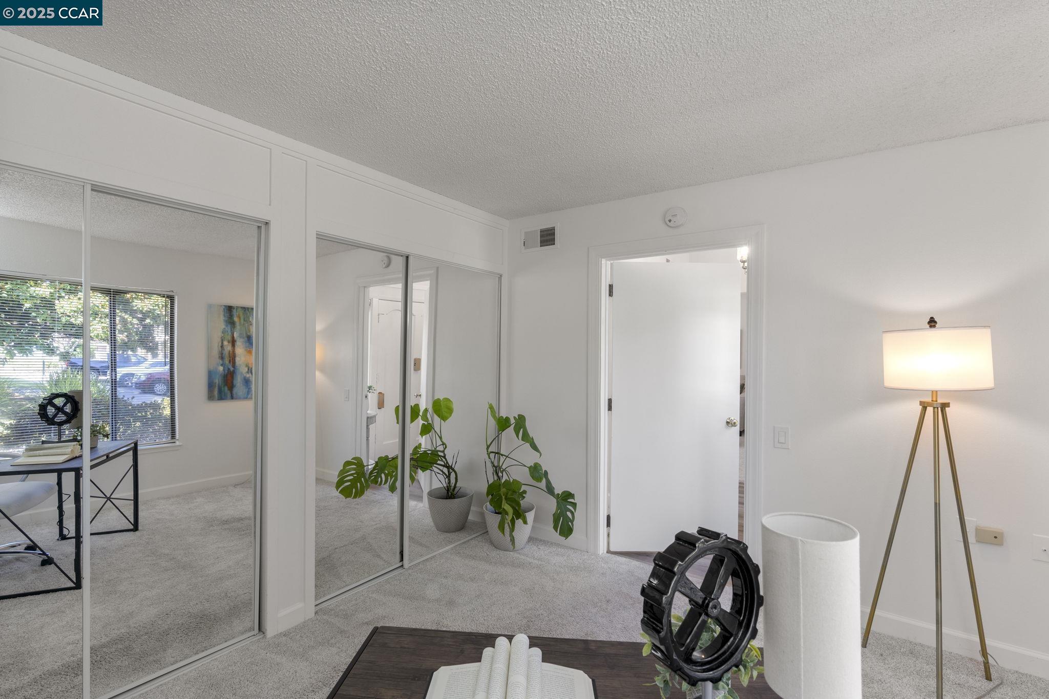 2017 Pine Knoll Drive, Unit 4 Walnut Creek, CA 94595 - Photo 16 of 21 a view of a entryway and room with furniture