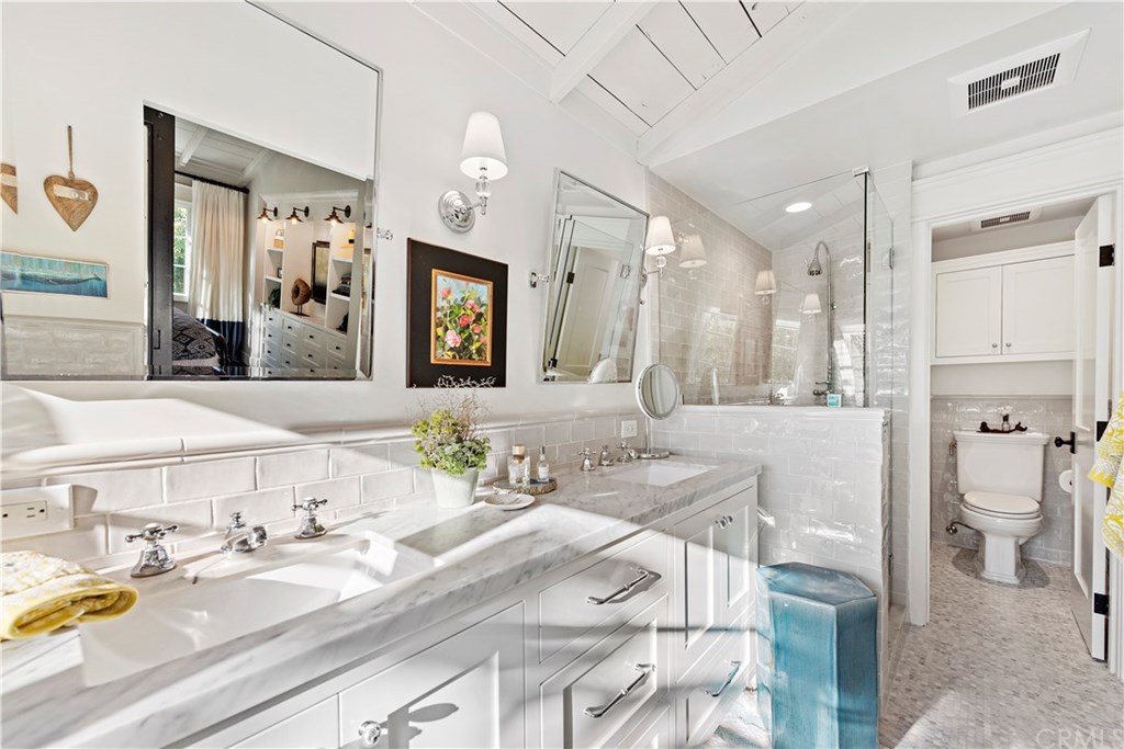 464 El Bosque Laguna Beach, CA 92651 - Photo 14 of 25 Master bathroom shower and privacy door to toilet.