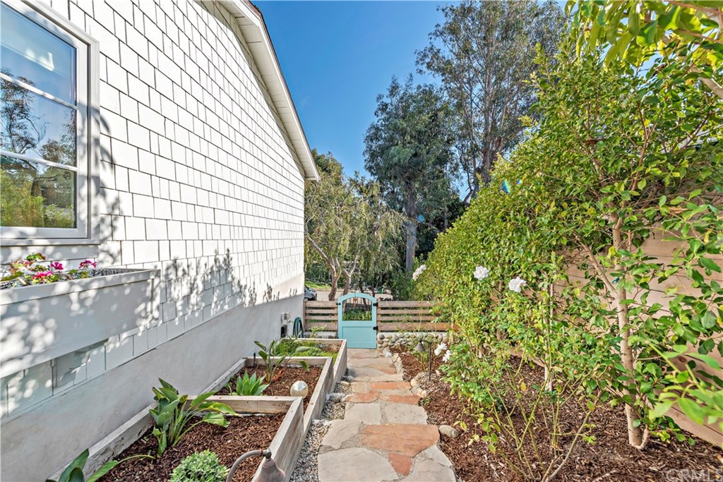 464 El Bosque Laguna Beach, CA 92651 - Photo 23 of 25 side of house with herb planter boxes.