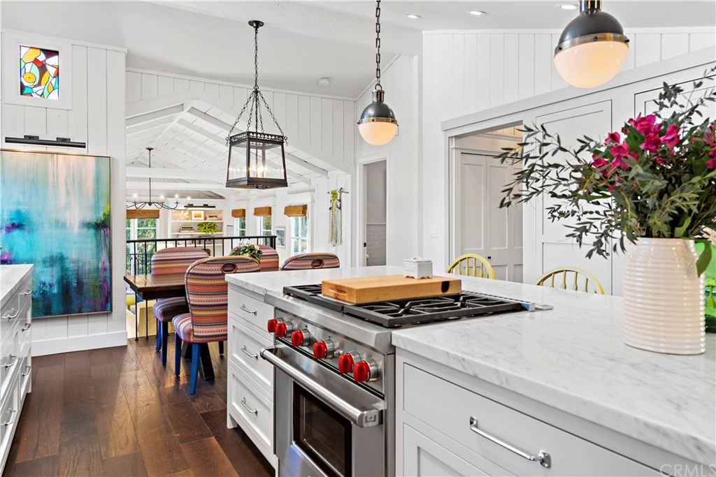464 El Bosque Laguna Beach, CA 92651 - Photo 6 of 25 Kitchen looking towards front of house. Punctuated by stained glass and perfectly harmonized lighting and more.