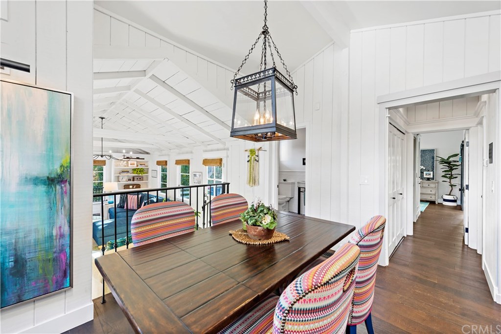 464 El Bosque Laguna Beach, CA 92651 - Photo 8 of 25 Dining area open to living room, door to half bath, and hall to master suite on first floor.