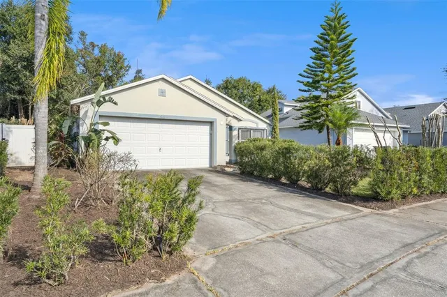a view of front of house with a yard